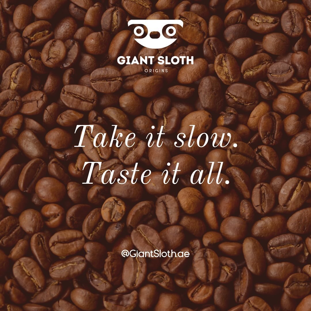 Coffee beans being carefully measured.